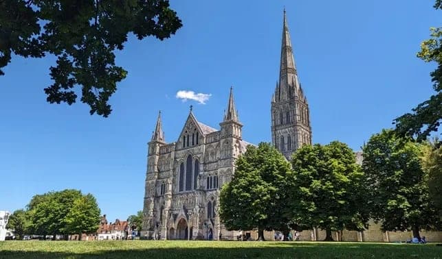 The spire of Salisbury Cathedral rising above the Close
