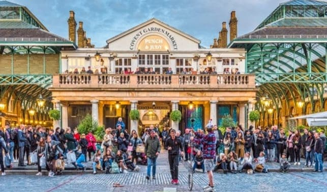 Crowds gathered in front of the Covent Garden Market building