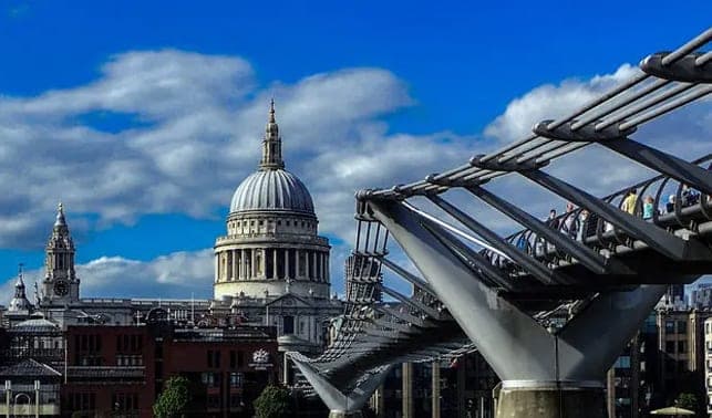 The steel Millennium Bridge leading towards the dome of St Paul's
