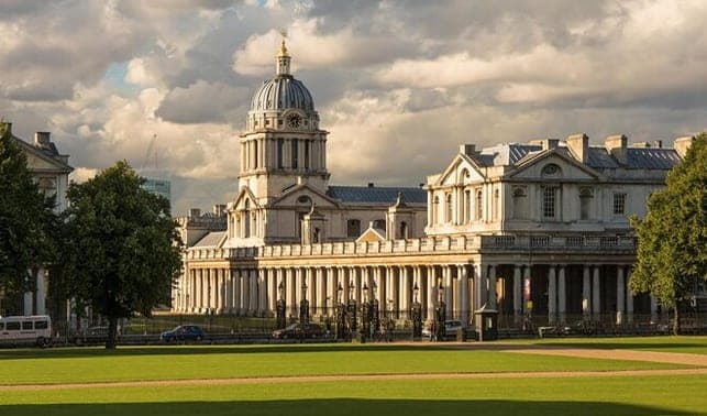 The domed Old Royal Naval College buildings across a green lawn