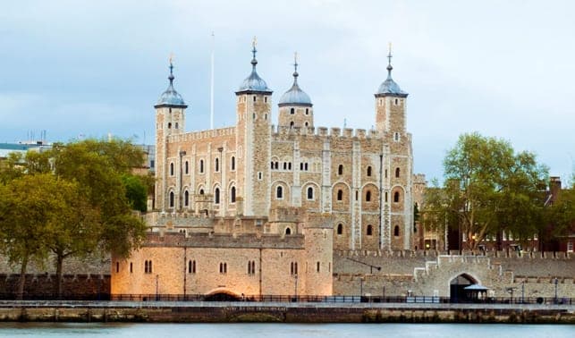 The White Tower of the Tower of London above its riverside walls