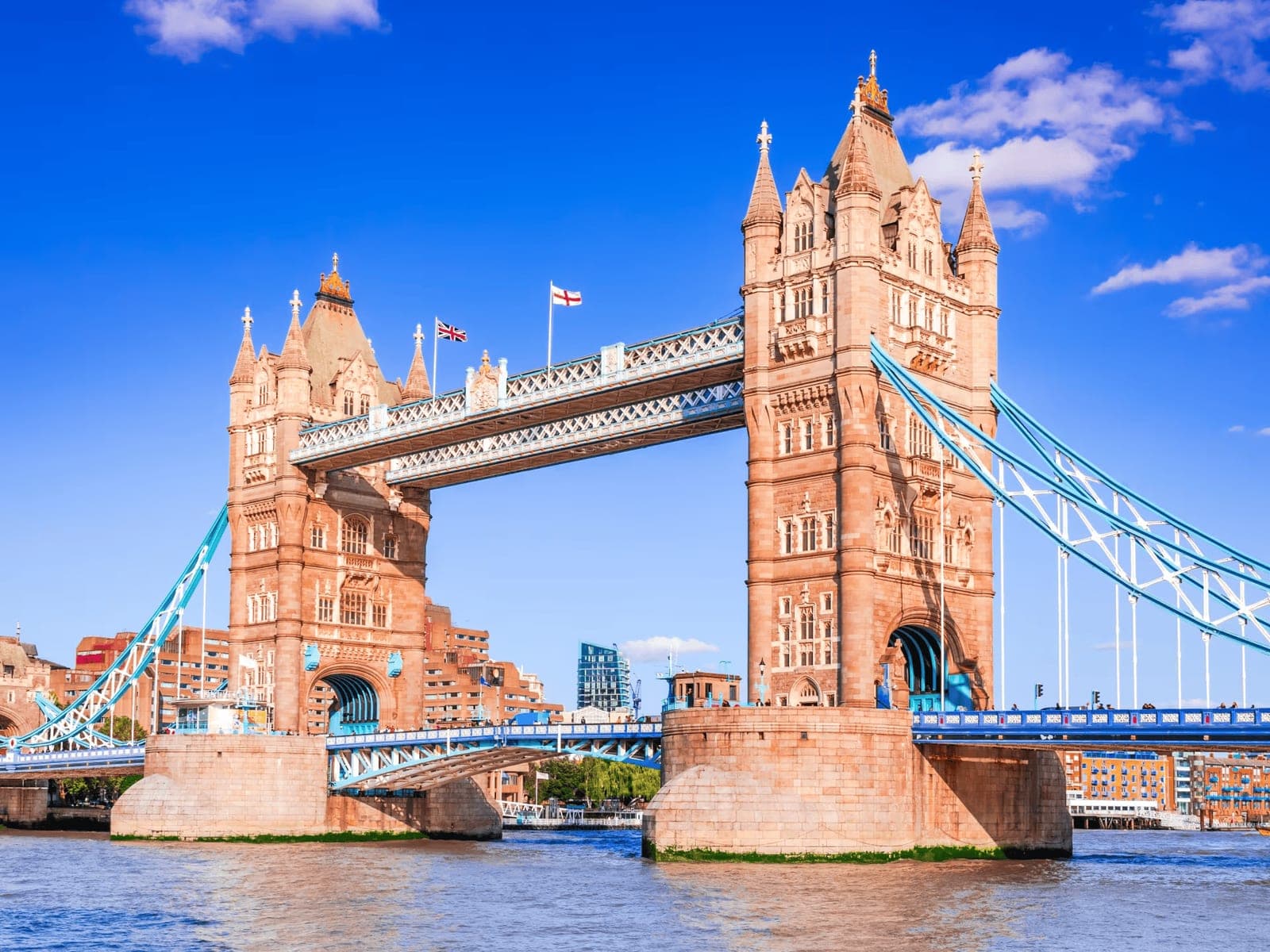 Tower Bridge over the River Thames under a blue sky